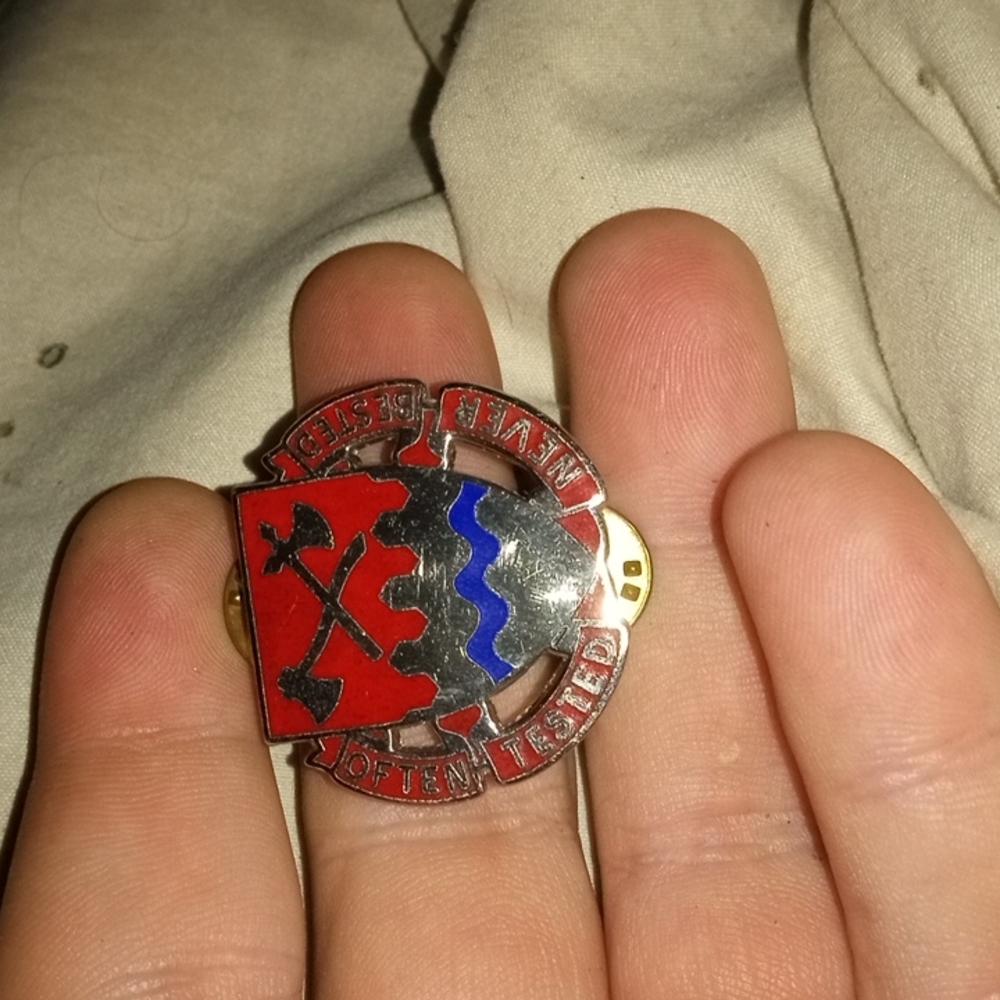 Often tested never bested fire department pin